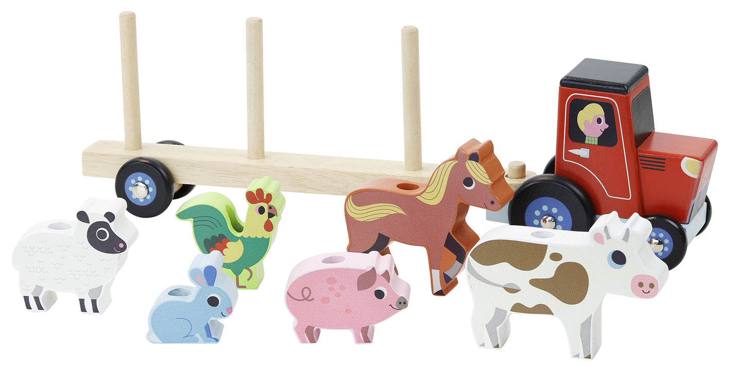 Traktor med henger og dyr