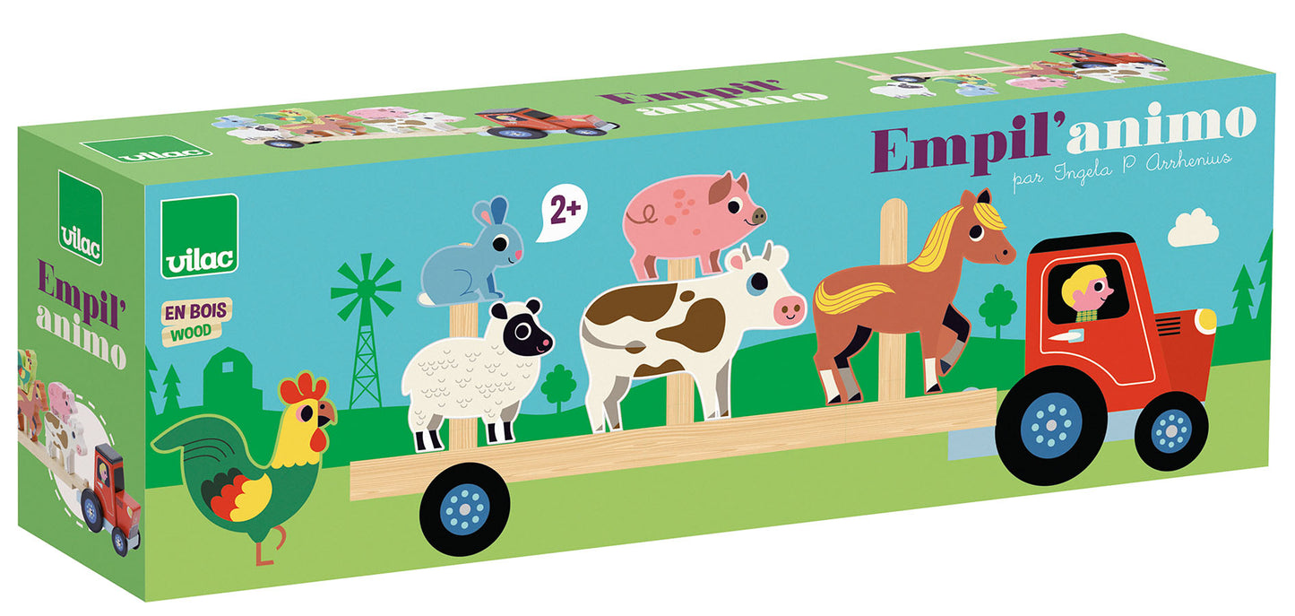 Traktor med henger og dyr